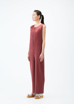 A model wears the PLEATS PLEASE ISSEY MIYAKE MONTHLY COLORS MAY jumpsuit.