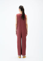 A model wears the PLEATS PLEASE ISSEY MIYAKE MONTHLY COLORS MAY jumpsuit.
