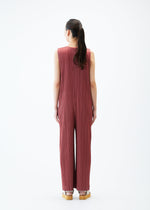 A model wears the PLEATS PLEASE ISSEY MIYAKE MONTHLY COLORS MAY jumpsuit.