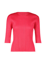 A product shot of the PLEATS PLEASE ISSEY MIYAKE MONTHLY COLORS MARCH top in bright pink (21).