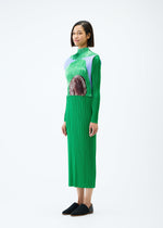 A model wears the PLEATS PLEASE ISSEY MIYAKE BACKLIGHT top.
