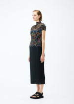 A model wears the PLEATS PLEASE ISSEY MIYAKE LIGHT FESTIVAL top.