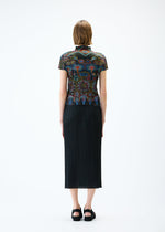 A model wears the PLEATS PLEASE ISSEY MIYAKE LIGHT FESTIVAL top.