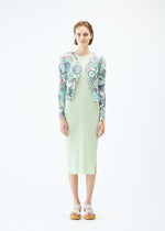 A model wears the PLEATS PLEASE ISSEY MIYAKE LIGHT FESTIVAL cardigan.