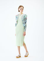 A model wears the PLEATS PLEASE ISSEY MIYAKE LIGHT FESTIVAL cardigan.