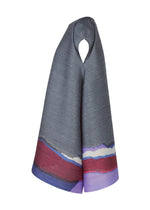 A detail shot of the PLEATS PLEASE ISSEY MIYAKE GRAINY COLORS tunic.