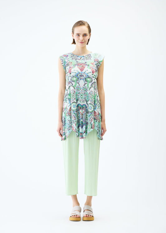 A model wears the PLEATS PLEASE ISSEY MIYAKE LIGHT FESTIVAL tunic.