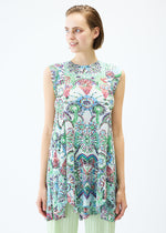 A model wears the PLEATS PLEASE ISSEY MIYAKE LIGHT FESTIVAL tunic.