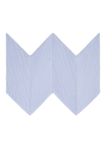 A detail shot of the PLEATS PLEASE ISSEY MIYAKE ZIGZAG PLEATS SCARF stole.