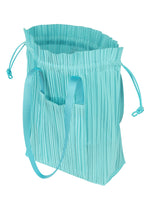 A detail shot of the PLEATS PLEASE ISSEY MIYAKE PLEATS TOTE BAG bag.