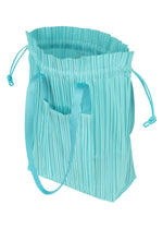 A detail shot of the PLEATS PLEASE ISSEY MIYAKE PLEATS TOTE BAG bag.