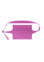 A detail shot of the PLEATS PLEASE ISSEY MIYAKE PLEATS SACOCHE bag.