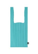 A product shot of the PLEATS PLEASE ISSEY MIYAKE PLEATS SHOPPING TOTE bag in .