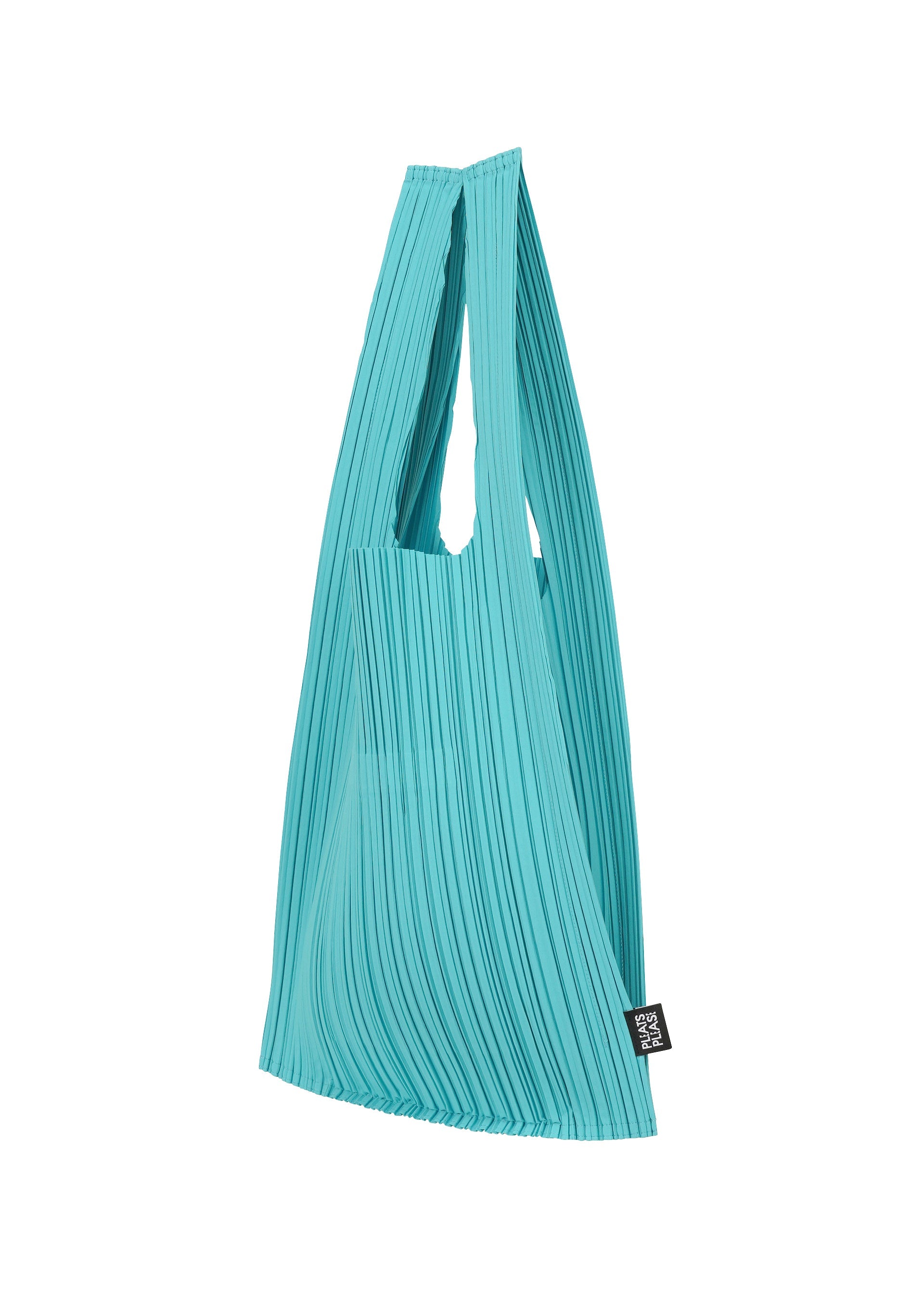 A detail shot of the PLEATS PLEASE ISSEY MIYAKE PLEATS SHOPPING TOTE bag.