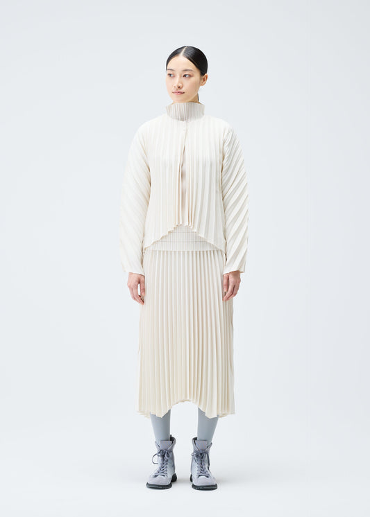A model wears the PLEATS PLEASE ISSEY MIYAKE CIRCULAR skirt.