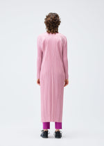 A model wears the PLEATS PLEASE ISSEY MIYAKE MONTHLY COLORS SEPTEMBER coat.