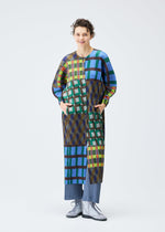 A model wears the PLEATS PLEASE ISSEY MIYAKE HARMONY clothing.