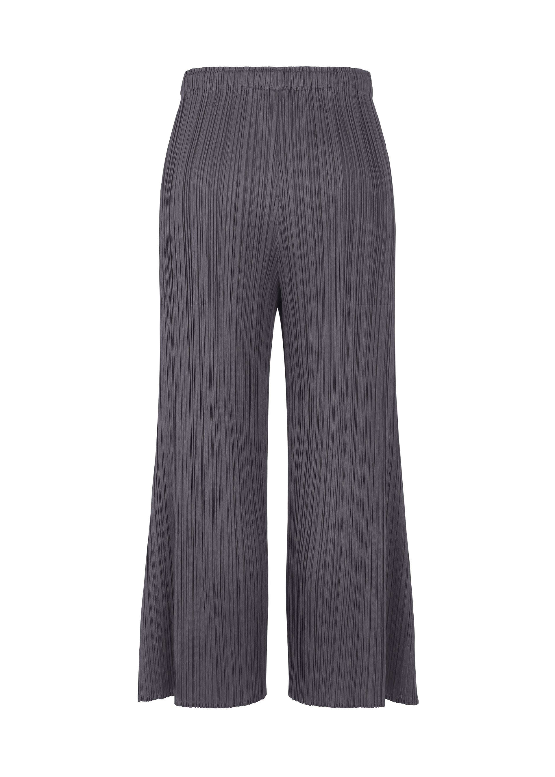 A detail shot of the PLEATS PLEASE ISSEY MIYAKE MONTHLY COLORS JULY trousers.