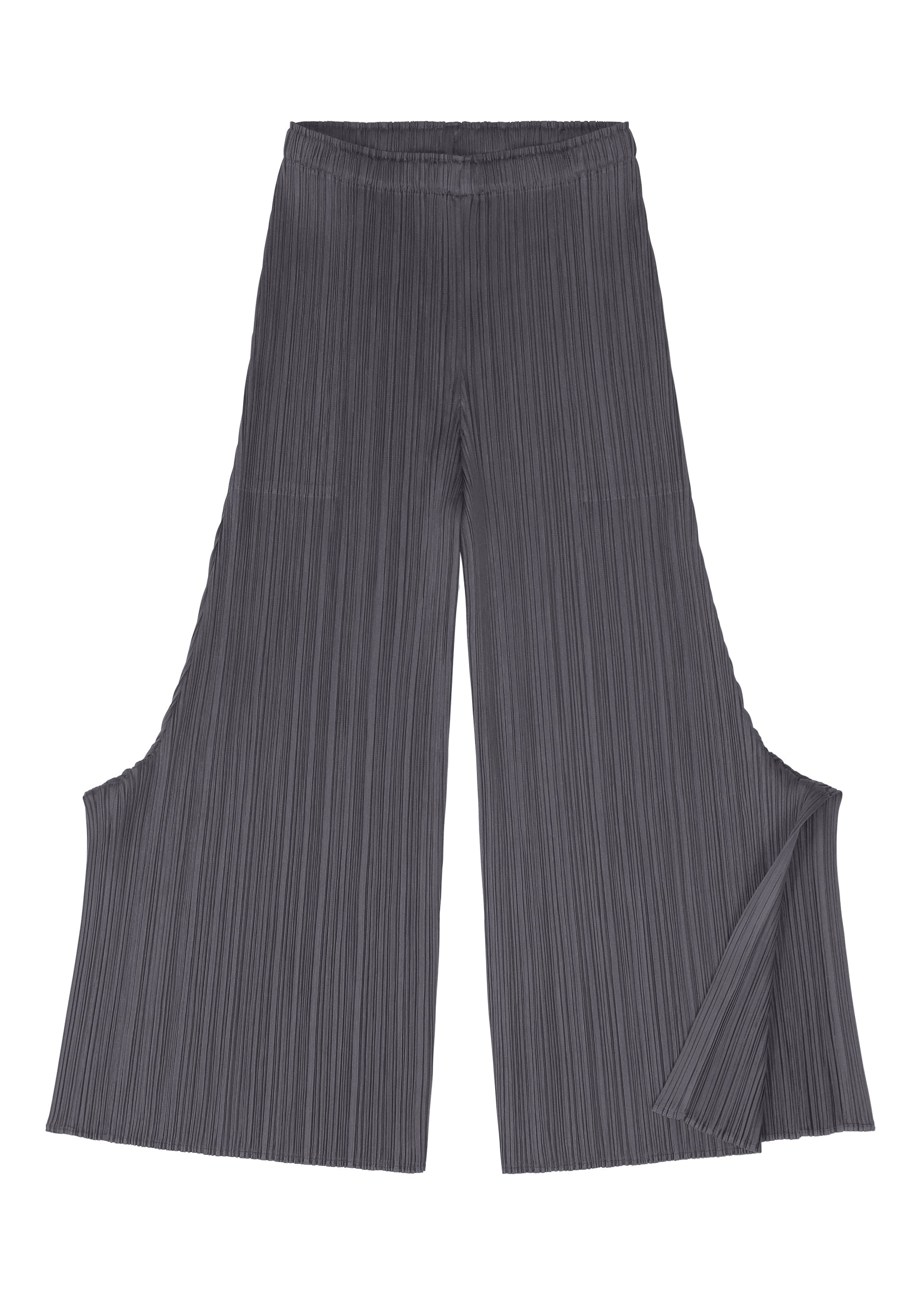 A detail shot of the PLEATS PLEASE ISSEY MIYAKE MONTHLY COLORS JULY trousers.