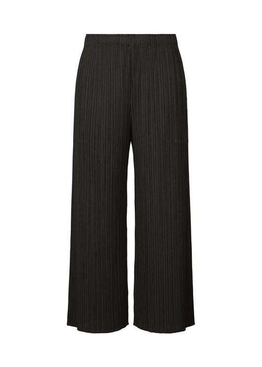 A product shot of the PLEATS PLEASE ISSEY MIYAKE MONTHLY COLORS AUGUST trousers in black (15).