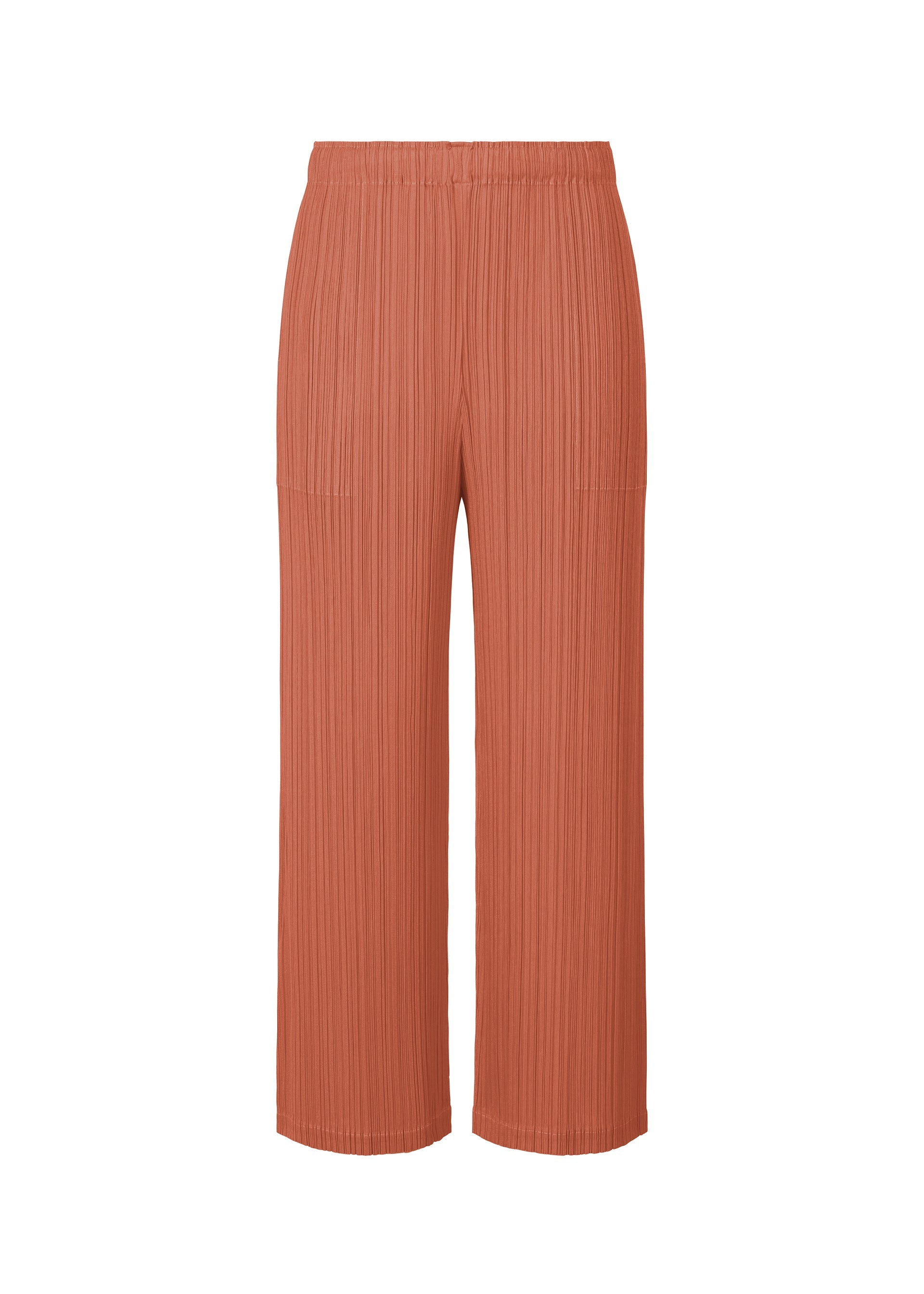 A product shot of the PLEATS PLEASE ISSEY MIYAKE MONTHLY COLORS OCTOBER trousers in coral pink (29).