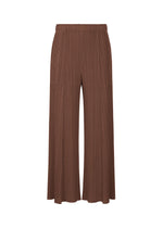 A product shot of the PLEATS PLEASE ISSEY MIYAKE MONTHLY COLORS NOVEMBER trousers in brown (44).