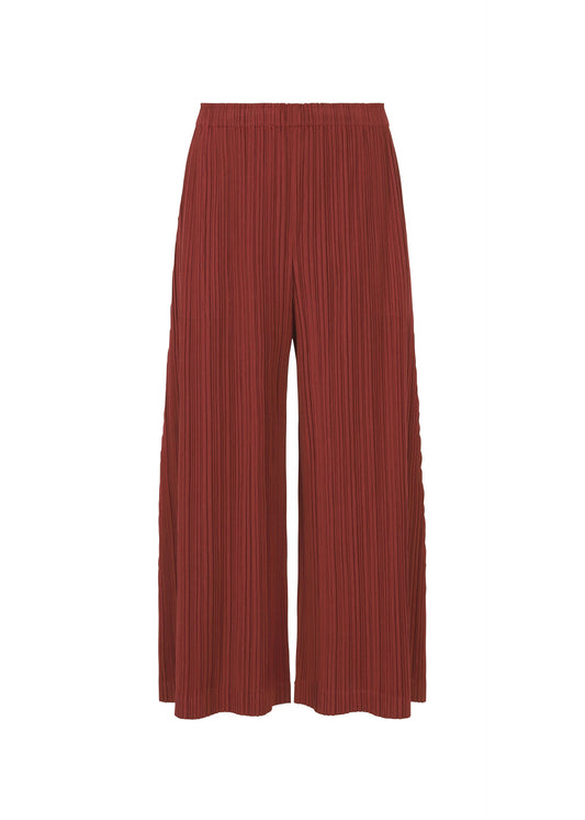 A product shot of the PLEATS PLEASE ISSEY MIYAKE WOOL PLEATS trousers in brown red (45).