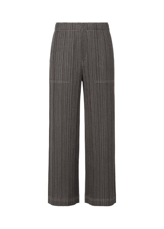 A product shot of the PLEATS PLEASE ISSEY MIYAKE COTTON DENIM trousers in black (15).