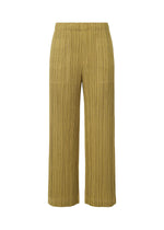 A product shot of the PLEATS PLEASE ISSEY MIYAKE COTTON DENIM trousers in mustard (59).