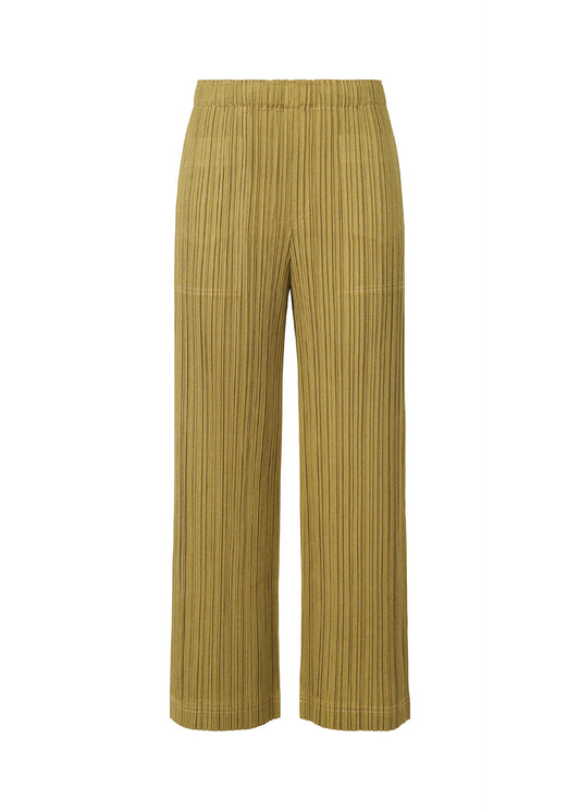 A product shot of the PLEATS PLEASE ISSEY MIYAKE COTTON DENIM trousers in mustard (59).