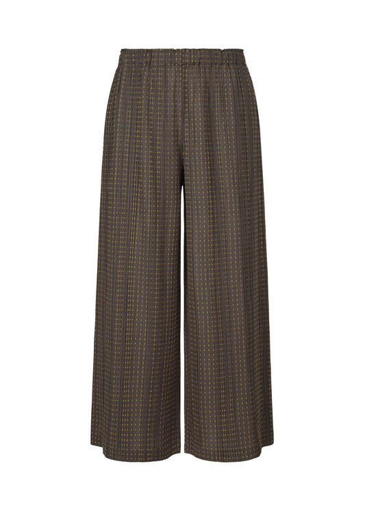 A product shot of the PLEATS PLEASE ISSEY MIYAKE COTTON SKIP trousers in dark brown.