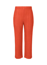 A product shot of the PLEATS PLEASE ISSEY MIYAKE THICKER BOTTOMS 1 trousers in bright red.