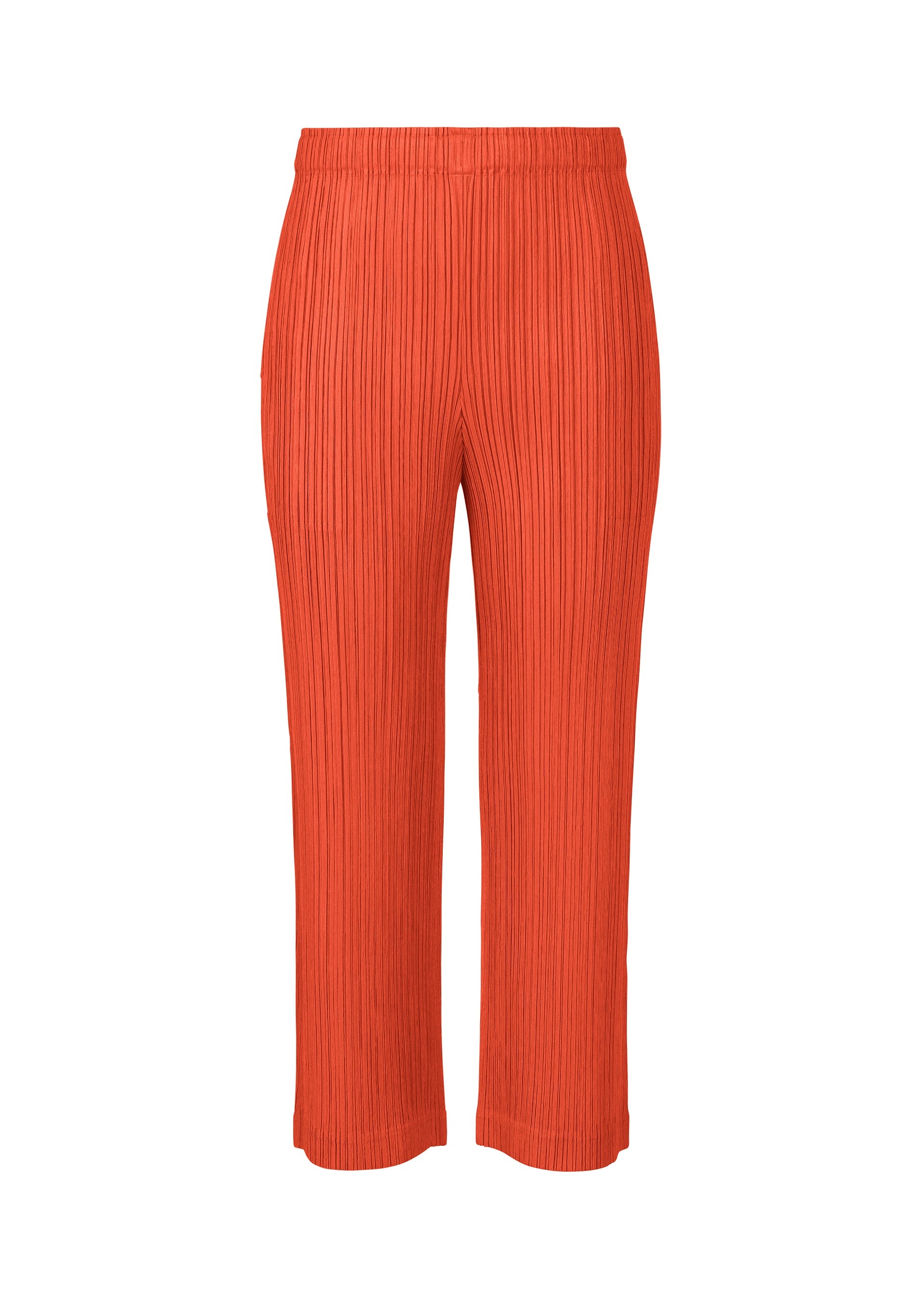 A product shot of the PLEATS PLEASE ISSEY MIYAKE THICKER BOTTOMS 1 trousers in bright red.