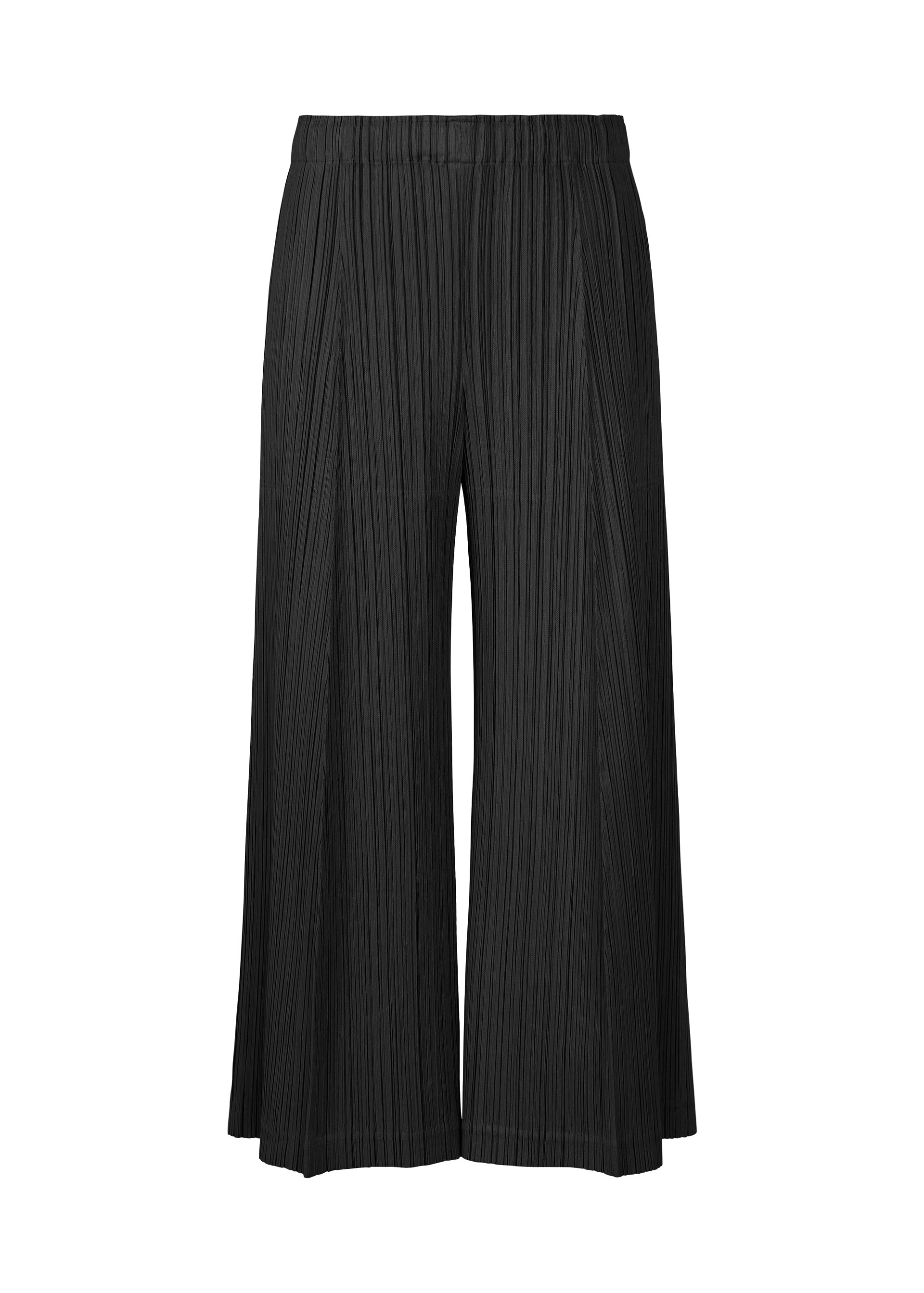 A product shot of the PLEATS PLEASE ISSEY MIYAKE THICKER BOTTOMS 1 trousers in black.