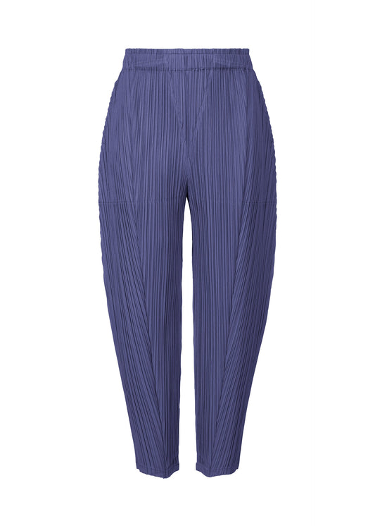 A product shot of the PLEATS PLEASE ISSEY MIYAKE THICKER BOTTOMS 2 trousers in deep blue (76).