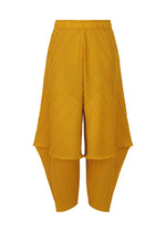 A product shot of the PLEATS PLEASE ISSEY MIYAKE LEAP trousers in mustard.