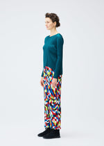 A model wears the PLEATS PLEASE ISSEY MIYAKE DANCING SQUARE trousers.