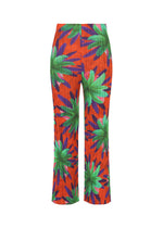 A product shot of the PLEATS PLEASE ISSEY MIYAKE CARNIVAL trousers in red (24).