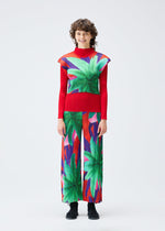 A model wears the PLEATS PLEASE ISSEY MIYAKE CARNIVAL trousers.