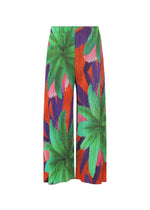 A product shot of the PLEATS PLEASE ISSEY MIYAKE CARNIVAL trousers in red (24).