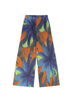 A detail shot of the PLEATS PLEASE ISSEY MIYAKE CARNIVAL trousers.