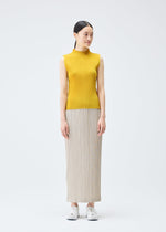 A model wears the PLEATS PLEASE ISSEY MIYAKE THICKER BOTTOMS 1 skirt.