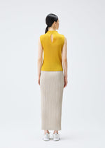 A model wears the PLEATS PLEASE ISSEY MIYAKE THICKER BOTTOMS 1 skirt.
