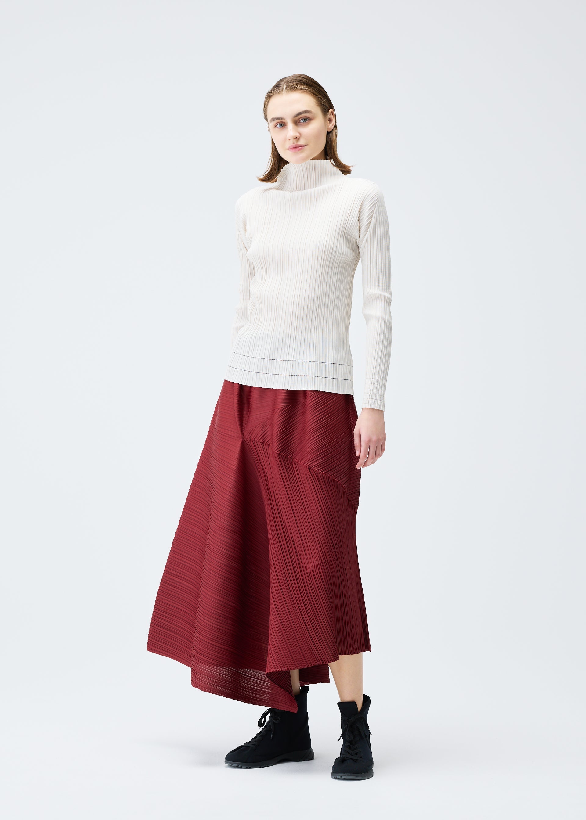A model wears the PLEATS PLEASE ISSEY MIYAKE SPIN skirt.