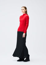 A model wears the PLEATS PLEASE ISSEY MIYAKE OLE! clothing.