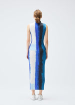 A model wears the PLEATS PLEASE ISSEY MIYAKE JUMP skirt.