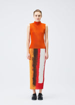 A model wears the PLEATS PLEASE ISSEY MIYAKE JUMP skirt.