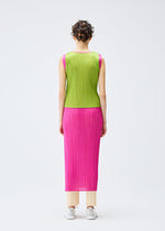 A model wears the PLEATS PLEASE ISSEY MIYAKE LUCID PLEATS dress.