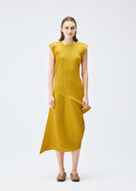 A model wears the PLEATS PLEASE ISSEY MIYAKE LEAP dress.