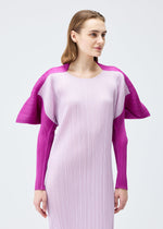 A model wears the PLEATS PLEASE ISSEY MIYAKE SQUARE dress.